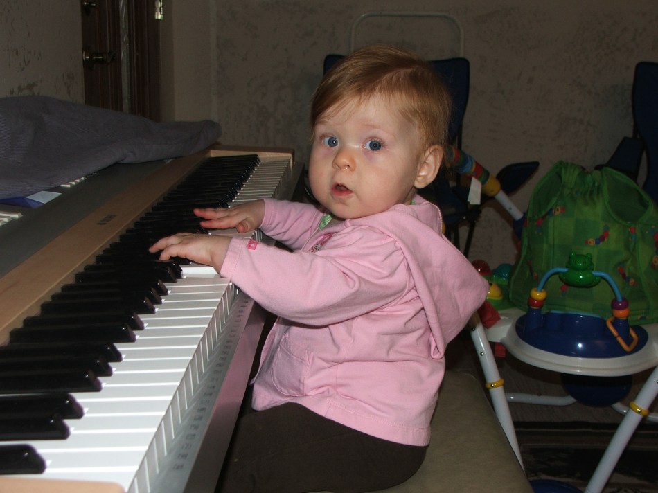 Violet likes to tickle the ivorys!